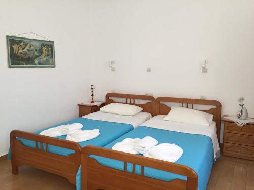 Postel nebo postele na pokoji v ubytování Livanina apartments
