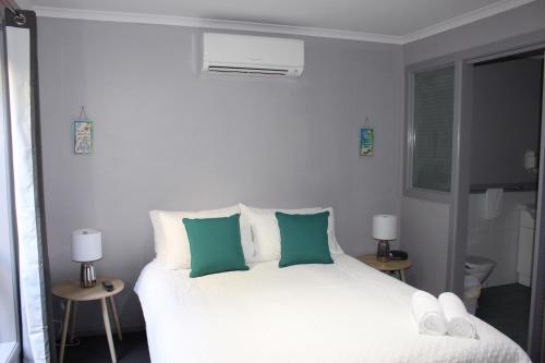 Postel nebo postele na pokoji v ubytování Aqualuna Apartments