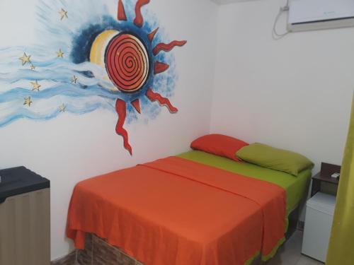 Cama ou camas em um quarto em Hospedaje San Andres Vive Centro