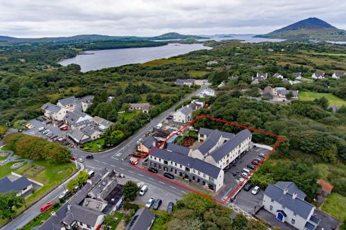 an aerial view of a town with a building and a river at Apartment 707 Letterfrack in Letterfrack