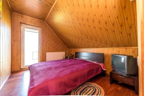 TV a/nebo společenská místnost v ubytování Edmart