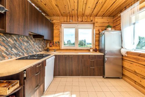 Virtuvė arba virtuvėlė apgyvendinimo įstaigoje Edmart