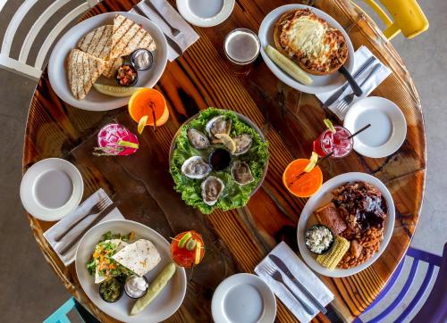 a table full of plates of food on a table at Beach Shack in Cape May