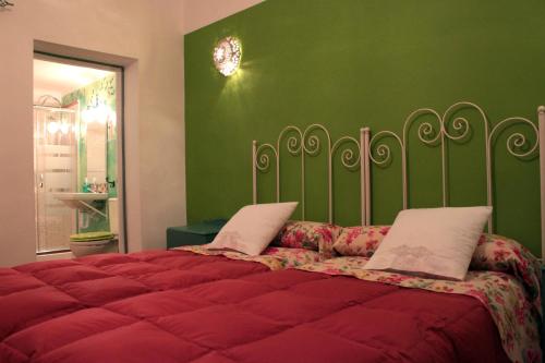 Katil atau katil-katil dalam bilik di Casa Rural La Alfarera