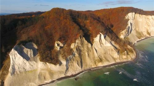 an aerial view of a rocky mountain next to the ocean at Spacious Private Apartment for Family Holiday in Stege