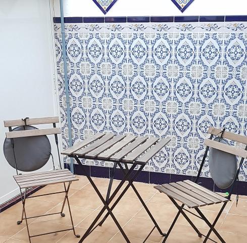 A seating area at HISPALIS SAN LUIS