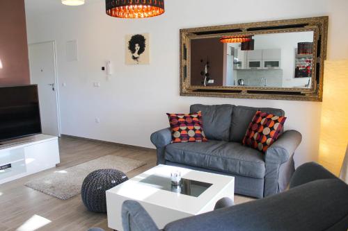 Posezení v ubytování Luxury apartment with private pool