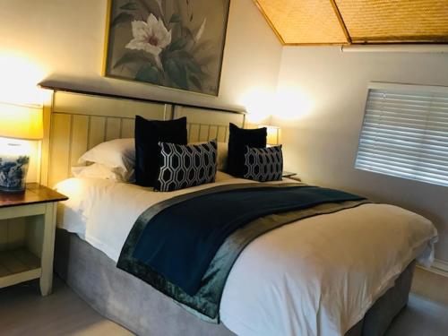 Ένα ή περισσότερα κρεβάτια σε δωμάτιο στο Valley Lodge