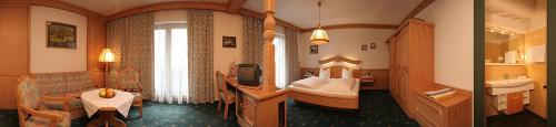 two pictures of a hotel room with a bedroom at Ferienwohnungen Hauser in Sankt Jakob in Defereggen