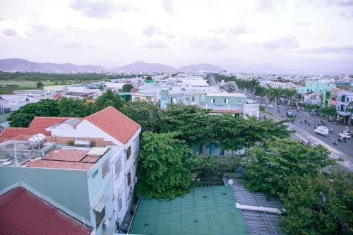 an aerial view of a city with buildings and a street at Hoang Thuy Sinh Hotel in Da Nang