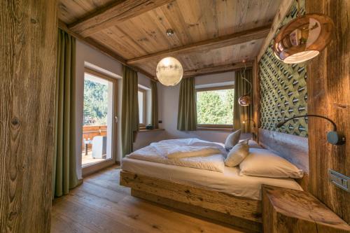 Krevet ili kreveti u jedinici u okviru objekta Alpine Residence Villa Adler
