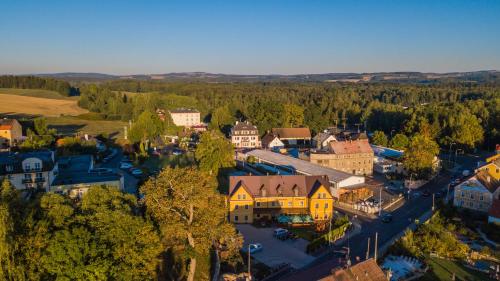 an aerial view of a small town with buildings at Penzion Eduard in Františkovy Lázně