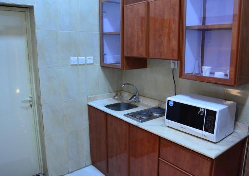 Küche/Küchenzeile in der Unterkunft Sheraz Suites