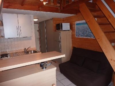 a kitchen with a sink and a counter top at Mont Blanc Soleil E17 in Manigod