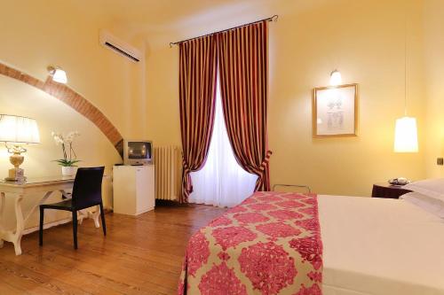 Katil atau katil-katil dalam bilik di Relais Lavagnini Florence