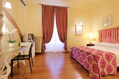 Katil atau katil-katil dalam bilik di Relais Lavagnini Florence