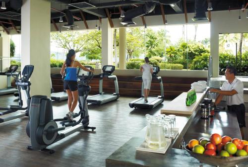a group of people exercising in a gym at Shangri-La Tanjung Aru, Kota Kinabalu in Kota Kinabalu