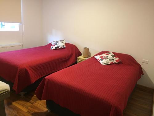 Katil atau katil-katil dalam bilik di Xalpen B&B