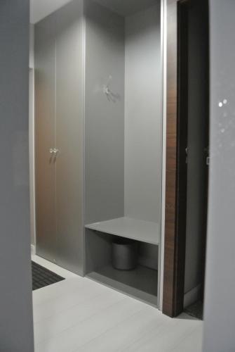 a bathroom with a sink and a shower stall at Apartamenty Centrum- Kochanowskiego -dawniej two-bedroom Apartment in Zielona Góra