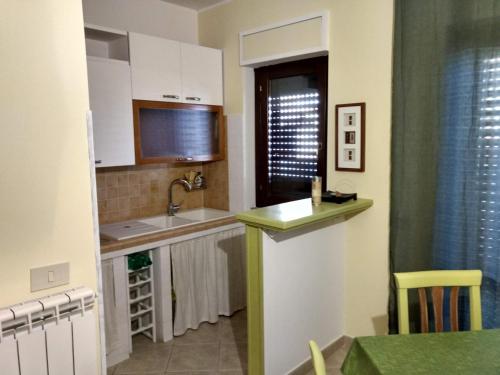 Η κουζίνα ή μικρή κουζίνα στο Appartamento Salvatore