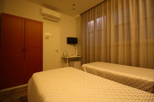 Postel nebo postele na pokoji v ubytování Recia Room