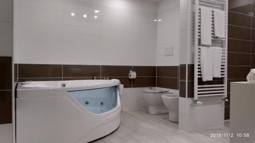 Koupelna v ubytování Hotel Glis