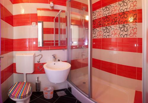 a bathroom with a sink and a shower at Villa Marijeta Hvar in Hvar
