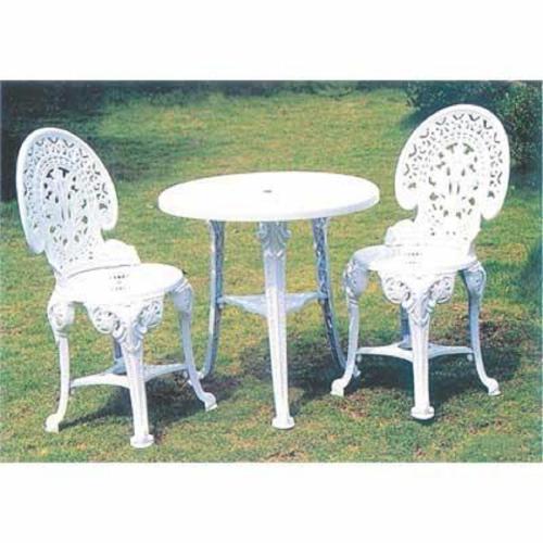 two chairs and a table and a table and chairs at LeMarida Suites in Saint Peter