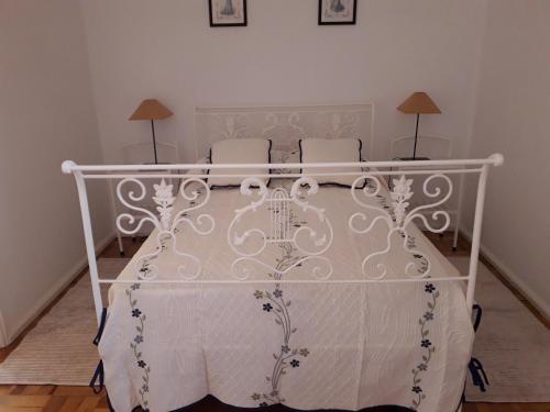 En eller flere senge i et værelse på A Casinha