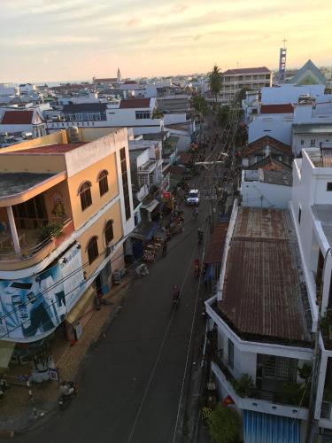 an overhead view of a city street with buildings at Hotel Tan Phu in La Gi