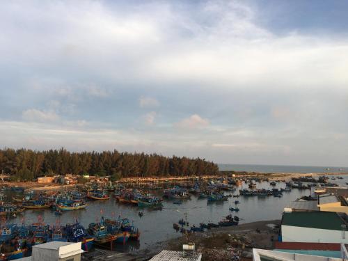 a bunch of boats are docked in a harbor at Hotel Tan Phu in La Gi