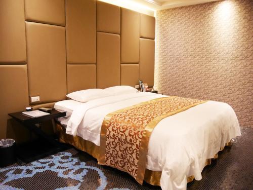 Cama o camas de una habitación en Refinement Motel
