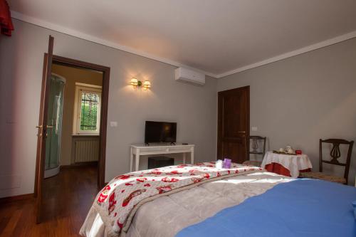 Posteľ alebo postele v izbe v ubytovaní B&B Casa dell'Orso