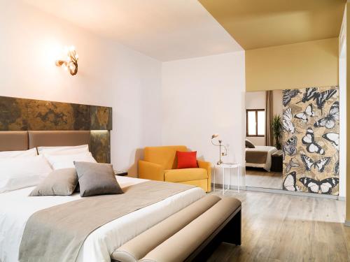 Кровать или кровати в номере Residenza del Borgo