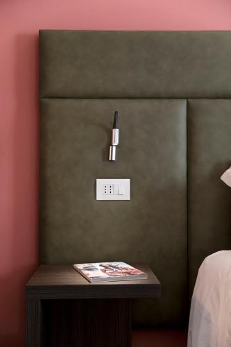 Кровать или кровати в номере Residenza del Borgo