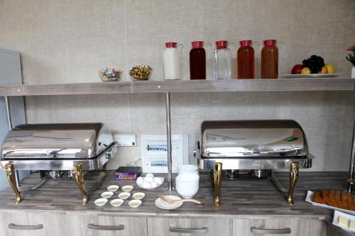 Η κουζίνα ή μικρή κουζίνα στο Hotel Naxshab
