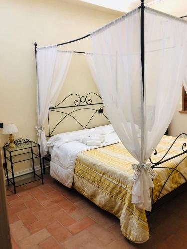 Cama o camas de una habitación en Agriturismo Beata Vanna