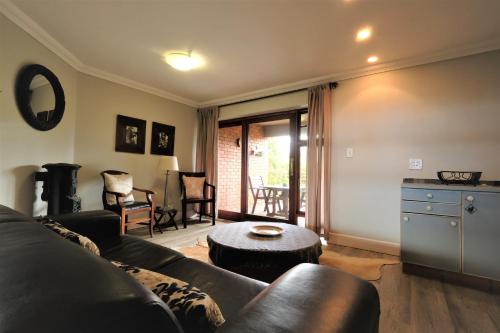 Posezení v ubytování Dolphin Dunes Guesthouse