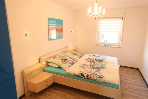 Katil atau katil-katil dalam bilik di B&B’s im Aischgrund