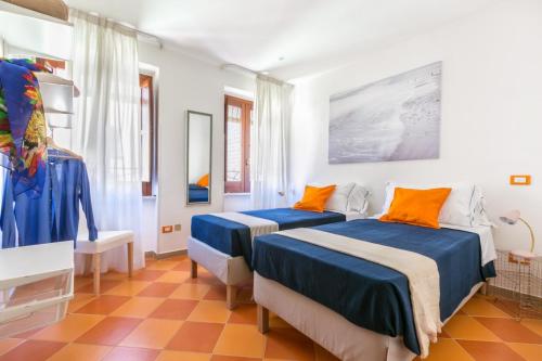 Postel nebo postele na pokoji v ubytování Terrazza Felicienne