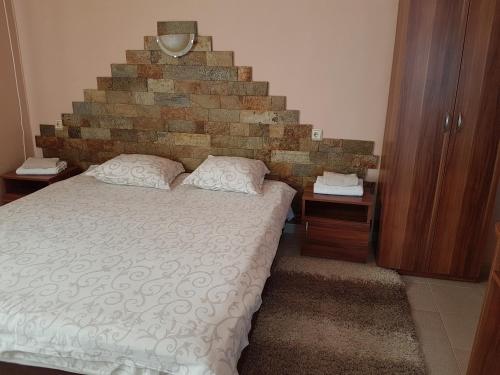 Katil atau katil-katil dalam bilik di Family Hotel Zhelkovi - Olympia