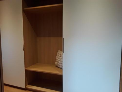 a cupboard with a pillow sitting inside of it at Appartment Hirschberg in Bizau