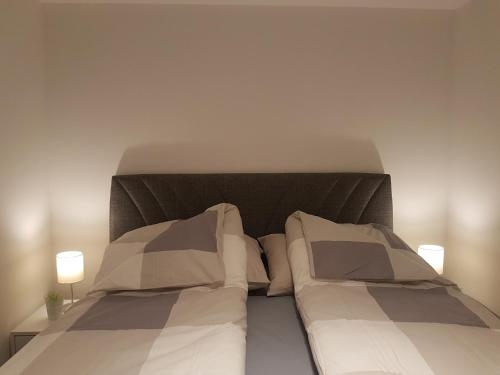 Säng eller sängar i ett rum på 4 Seasons Vlašić Lux Apartments