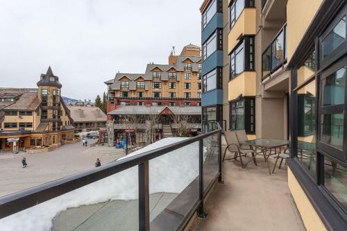 a balcony with a view of a city street at Gibbons Life Accommodations in Whistler