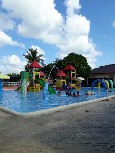 a large water park with people playing in it at Sea Garden Resort Iloilo in Iloilo City