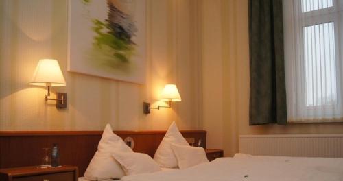 Postel nebo postele na pokoji v ubytování Hotel Mohr & Spa