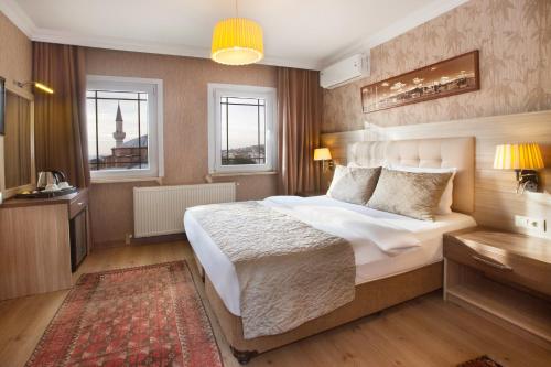 Postel nebo postele na pokoji v ubytování Sultanahmet inn Hotel