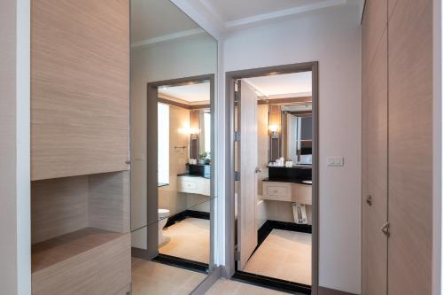 Katil atau katil-katil dalam bilik di Jasmine City Hotel