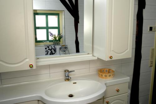 A bathroom at Bed & Breakfast De Corylus