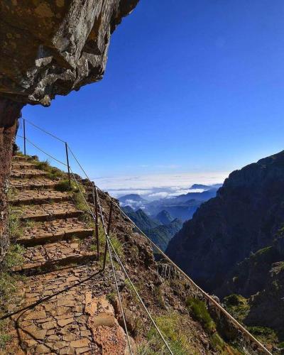 a set of stairs on top of a mountain at Villa SCIROCCO Madeira - Ocean View in Machico
